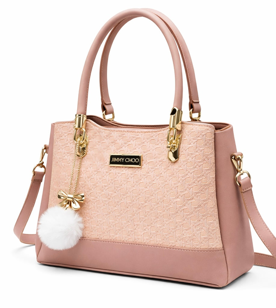 Elegant Designer Handbag with Gold Hardware & Pom-Pom Charm